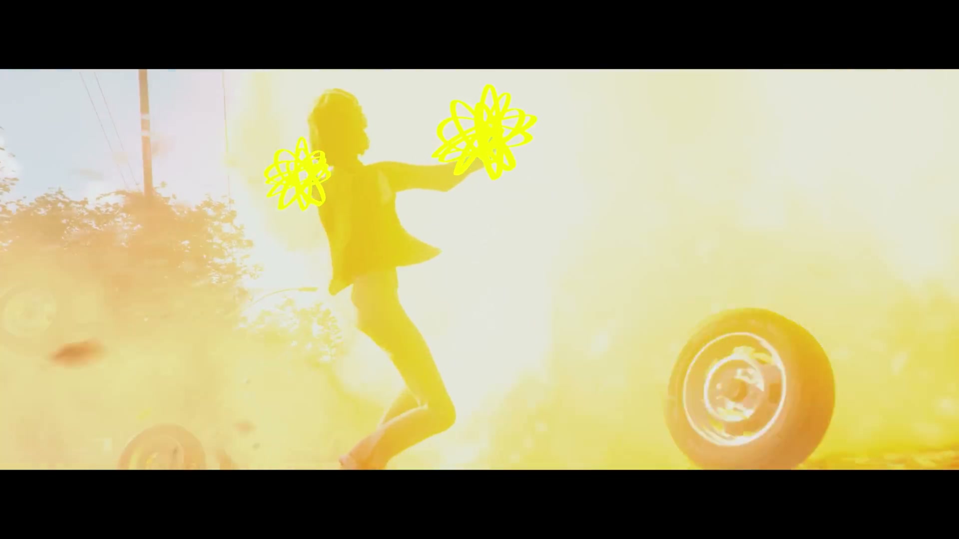 Mixtape trailer still with a bright spotlight scene